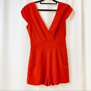 Red Bebe V-neck Tie Back Zip Up Romper Small